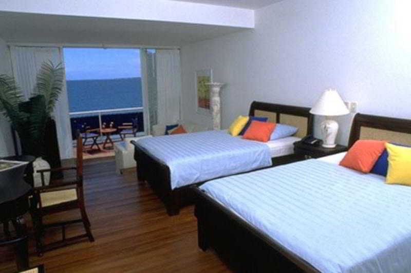سكاربورو Blue Haven Hotel - Bacolet Bay - Tobago الغرفة الصورة